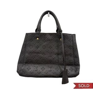 LOUIS VUITTON
Empreinte Montaigne GM